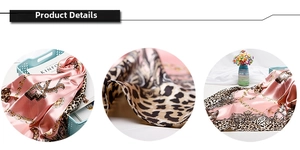 Macro detail of the leopard print satin silk scarf with gold chain patterns