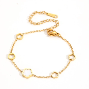 Elegant gold-plated stainless steel bracelet featuring hollow five-petal flower charms