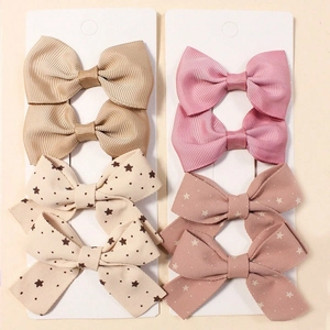 Detailed set of 8 pieces of striped and star pattern bow hair clips on display cards