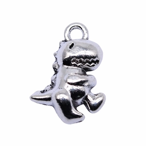 Silver dinosaur charm pendant made of polished metal in a cute cartoon T-Rex design