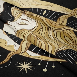 Detailed close-up showing textured fabric quality and gold art print of the wall tapestry