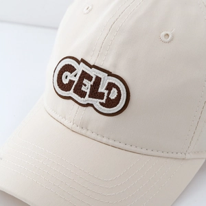 Kids cream cotton baseball cap with GELD embroidery and curved brim for daily wear