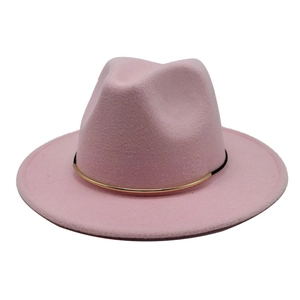 Pale pink wool fedora hat for women with a black band and gold curved metal accent