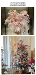 Detail of glittered artificial flower stems and decorated Christmas tree ornaments
