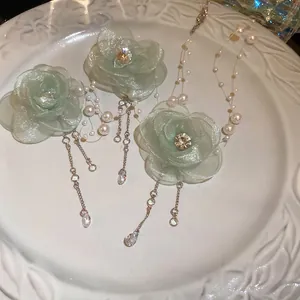 Elegant light green organza flower jewelry set with rhinestones and pearl tassels