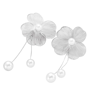 Detail of silver flower earrings with brushed metal finish and delicate pearl chain drops