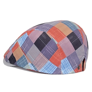 Side view of multi-color patchwork ivy cap showing textured fabric and metal buckle