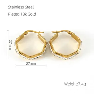 Detailed view of 27mm geometric hexagonal hoop earrings with clear zircon pavé setting