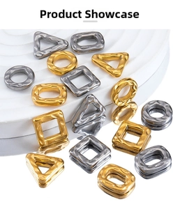 Detailed close-up of hammered geometric stainless steel pendants in gold and silver