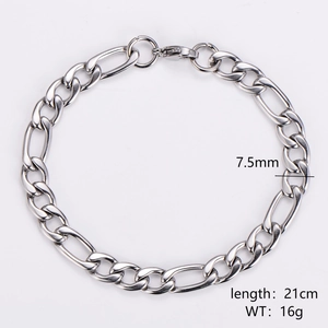 Close-up of 7.5mm silver Figaro link chain bracelet showing polished steel texture