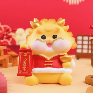 Detail of a dragon figurine holding a gold ingot and a scroll with lucky characters