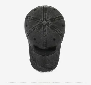 Detailed top view showing distressed brim and Purist embroidery on charcoal baseball cap
