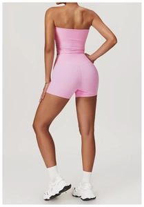 Detailed back view of high-waist yoga shorts and crop top with butt-lifting seams