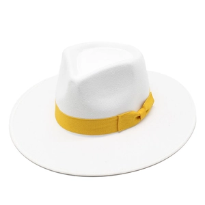 Detail view of white wool felt fedora hat featuring a bright yellow ribbon and bow trim