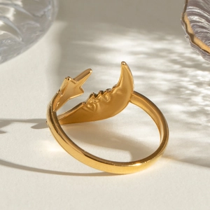 Adjustable 18k gold plated stainless steel ring featuring celestial moon and star design