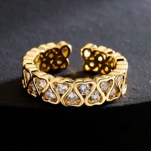 Luxurious 18K gold plated copper open ring with hollow heart shapes and clear zircons