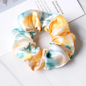 Elegant silk tie-dye hair scrunchie in yellow and green satin fabric for women