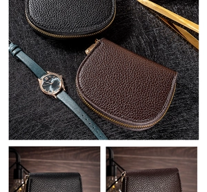 Close-up of semi-circle leather card cases with litchi grain and gold zippers