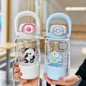 Detail of cute bear cartoon water bottles with straws and adjustable straps for kids