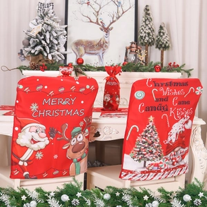 Christmas chair covers and wine bottle bags with Santa and reindeer patterns for dining