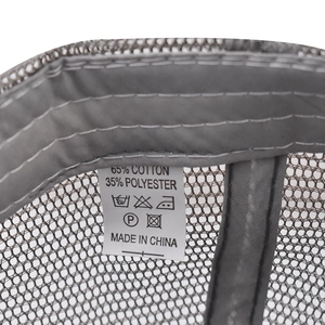 Detail view of cotton blend mesh cap interior with quality stitching and material label