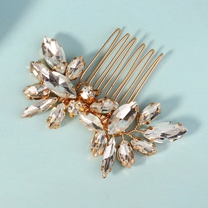 Exquisite bridal hair comb with marquise rhinestones and gold leaf design for weddings