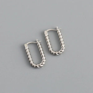 Detailed view of silver rectangular U-shaped hoop earrings with a twisted rope texture