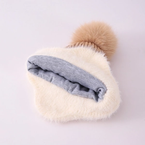Winter knit hat for kids with soft faux fur lining and a fluffy khaki pompom on top