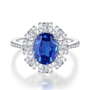 Elegant S925 sterling silver ring with oval blue sapphire and pavé diamond halo