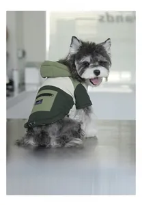 Detail of color-blocked hooded pet windbreaker with outdoor zipper pocket