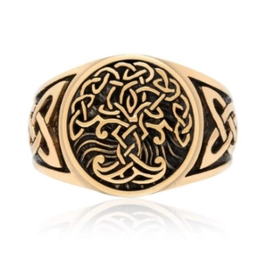 Detailed close-up of a vintage Tree of Life ring with antique gold finish and Celtic knots