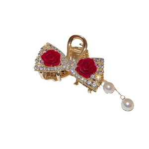 Elegant gold bow hair claw with red velvet roses, rhinestones and white pearl drops