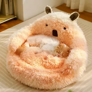 Pink plush capybara shaped pet bed for cats and small dogs, soft cozy winter pet cave
