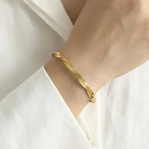 Minimalist 18k gold plated flat snake chain bracelet with twisted woven metal texture