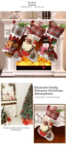 Detail of Christmas stockings set with 3D reindeer and Santa hanging on mantel