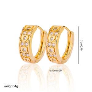 Detail showing 1.7cm gold hoop earrings with hollow hearts and clear zircon stones