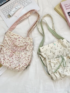 Floral canvas backpack set with pink and green flower patterns and checkered straps