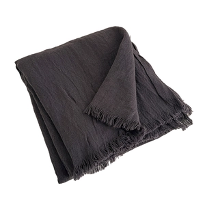 Dark gray meditation shawl with fringe detail on white background for zen practice