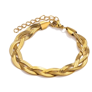 Detailed view of the layered gold-tone braided herringbone chain with a lobster clasp