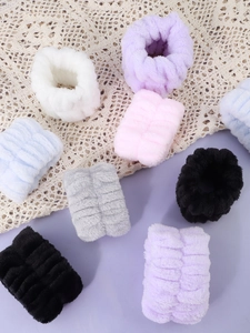 Detail of plush ribbed wristbands and headbands in colorful soft flannel fabric