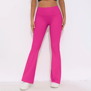 Close-up of high-waist yoga flared leggings in magenta with wide elastic waistband