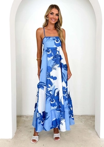 Detailed blue and white floral print on A-line maxi dress with cotton-linen texture