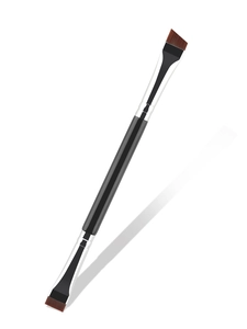 Detailed view of dual-ended makeup brush with angled and flat synthetic bristles
