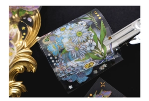 Macro detail of PET floral stickers with gold foil accents and vintage flower designs