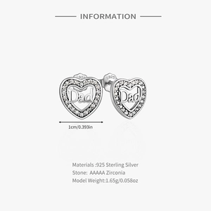 Macro detail of S925 sterling silver heart earrings with Dad engraving and zirconias