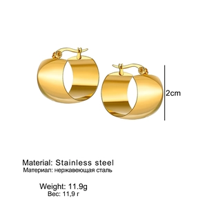 Polished gold C-shape chunky earrings with size and weight detail on white background