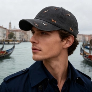 Vintage dark gray baseball cap with dachshund embroidery worn in Venice street style