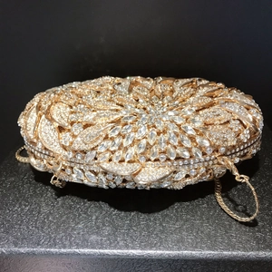 Luxury gold leaf flower clutch bag with radiant crystals and detachable chain strap