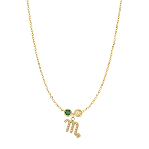 Detail of Scorpio zodiac pendant with sparkling gemstones on a gold chain necklace