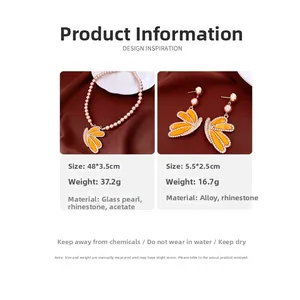 Detailed size and material specs for the yellow wing pendant jewelry set with pearls